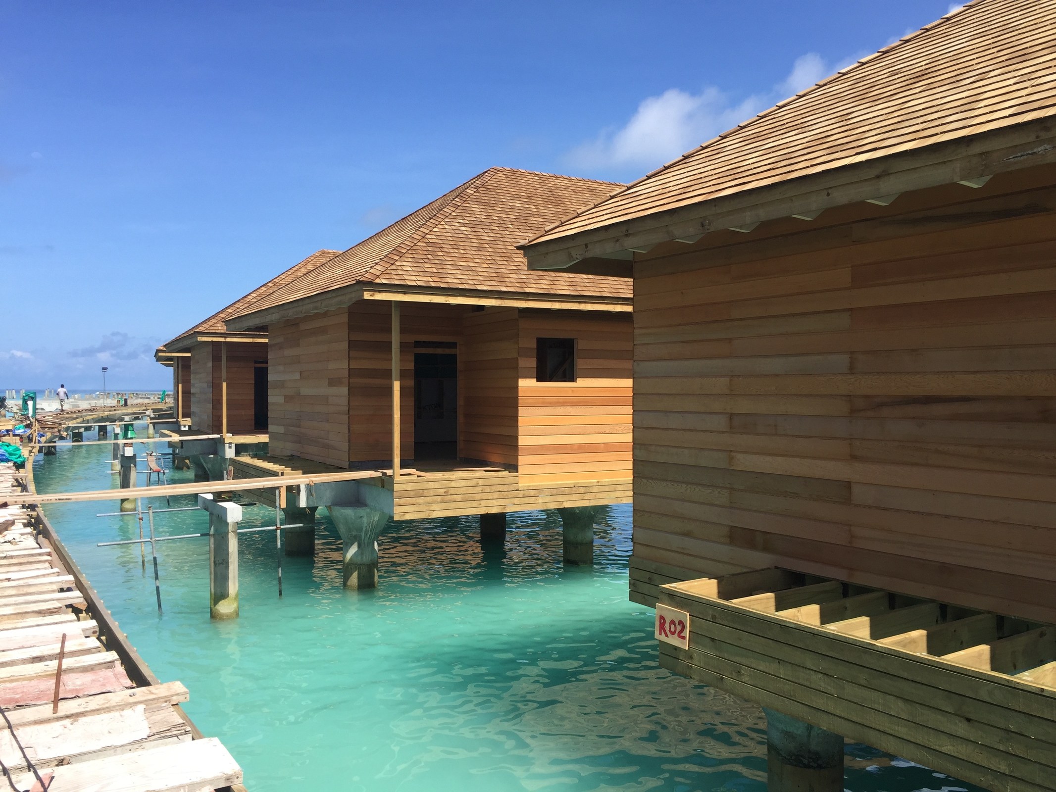 Overwater resort development and coordinated project supply